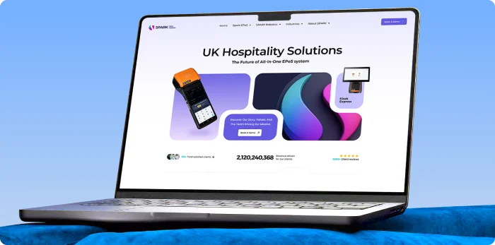 Spark Epos website homepage shown on a laptop